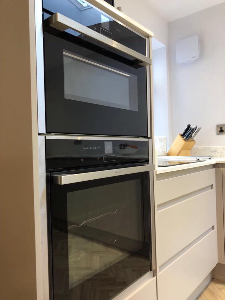 Integrated NEFF oven and microwave