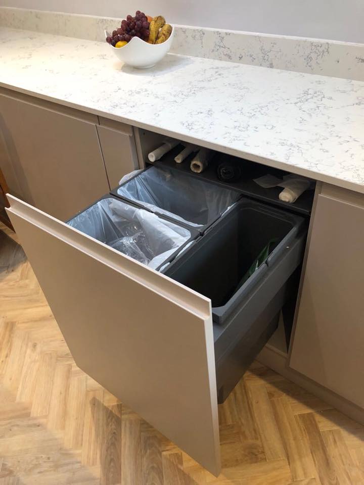 a handy drawer fitment contains a 3 bin recycle waste disposal unit